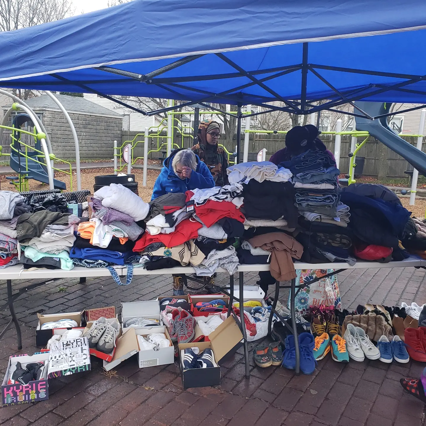 Community clothing and supply outreach organized by The 54th